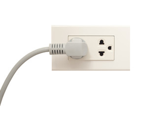 White electric socket on the wall. Close up.