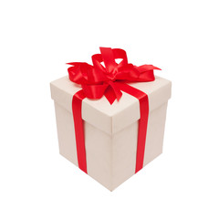 Festive gift. Beige box and red satin bow.