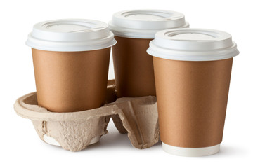 Three take-out coffee. Two cups in holder. - 47249997