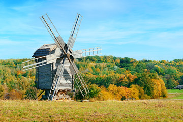 Fototapeta premium Old windmills on a picturesque hill