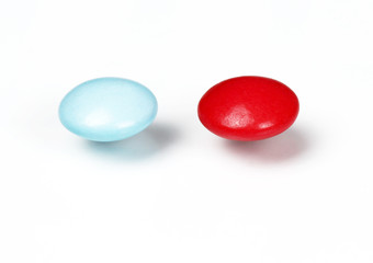 Red and blue tablets. Choice concept