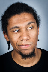 Obraz premium Portrait of young man with emotional facial expression