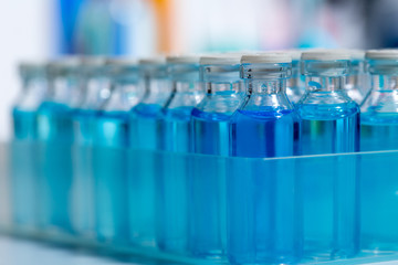 Chemical scientific laboratory blue glass bottles