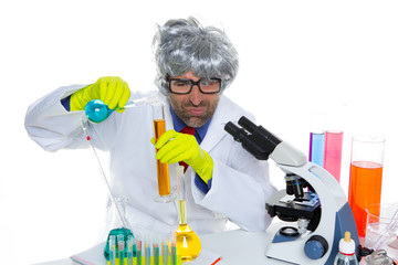 Crazy nerd scientist silly man on chemical laboratory