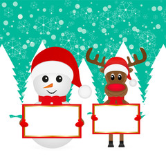 Christmas reindeer and snowman standing in the woods