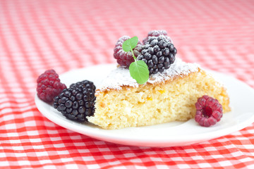 muffin with whipped cream, cake with icing, raspberry, blackberr