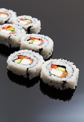 Sushi set on black reflection background