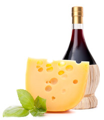 Red wine bottle and  cheese still life
