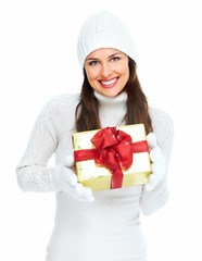 Beautiful young Christmas girl with gift.