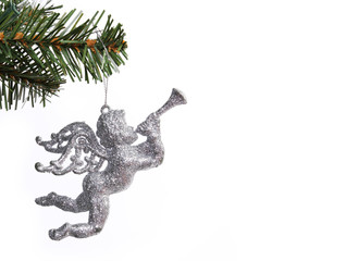 Glitter silver Angel toy on Christmas tree branch, isolated