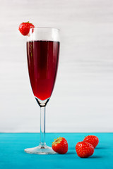 Strawberry wine or juice with berries
