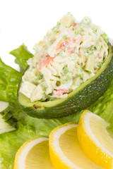 Crab meat salad with green caviar in avocado - japan cusine