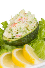 Crab meat salad with green caviar in avocado - japan cusine