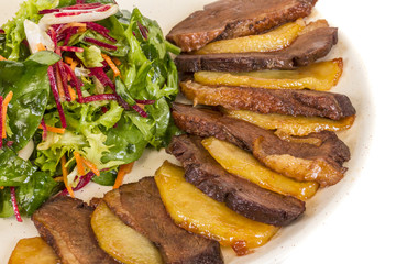 duck fillet, mashed potatoes seasoned with truffle oil, fig and