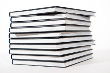 pile of books on white background