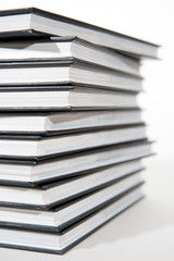 pile of books on white background