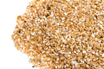 Pearl barley heap isolated on white