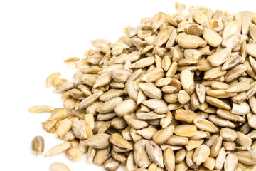 fresh sunflower seeds isolated on a white background