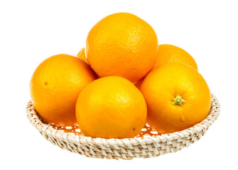 heap of oranges in the dish on white background