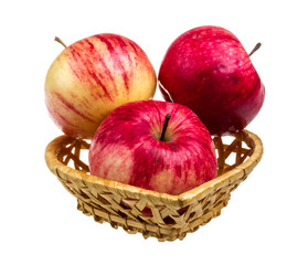 fresh red apples in the dish isolated on white background