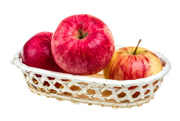 fresh red apples in the dish isolated on white background
