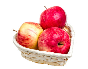 fresh red apples in the dish isolated on white background