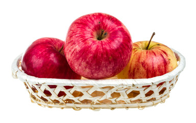 fresh red apples in the dish isolated on white background