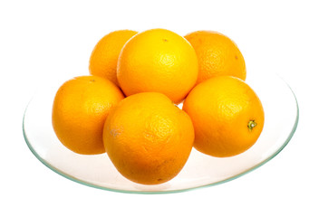 Heap of oranges in the dish