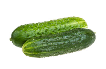 Healthy food. The green cucumbers isolated on white background