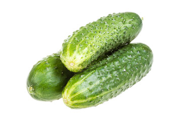 Healthy food. The green cucumbers isolated on white background