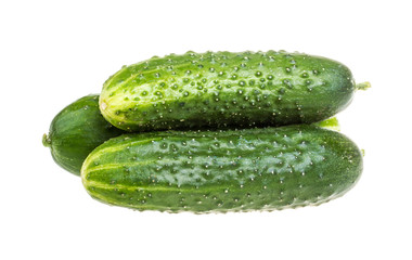 Healthy food. The green cucumbers isolated on white background