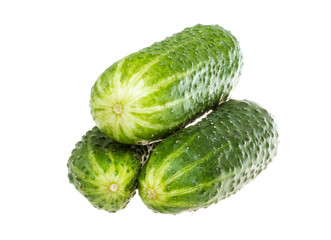 Healthy food. The green cucumbers isolated on white background