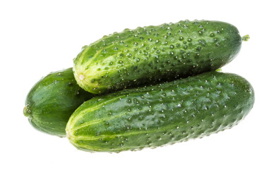 Healthy food. The green cucumbers isolated on white background