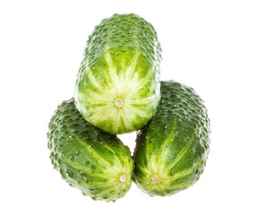 Healthy food. The green cucumbers isolated on white background