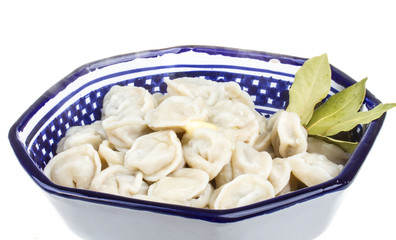 Bowl with traditional russian dish - pelmeni