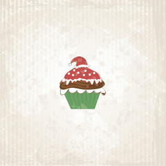 Weihnachtlicher Cupcake mit Weihnachtsmütze