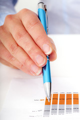 Hand holding pen
