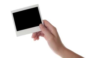 One instant photo in hand 