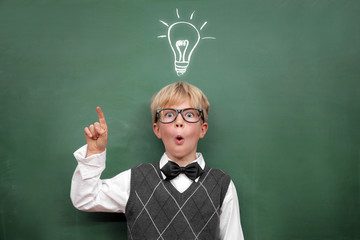 Schoolboy at the Blackboard with Idea