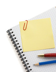 note paper and notebook on white