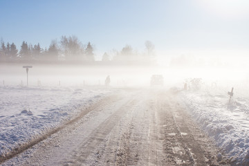 Winter road with off-road car