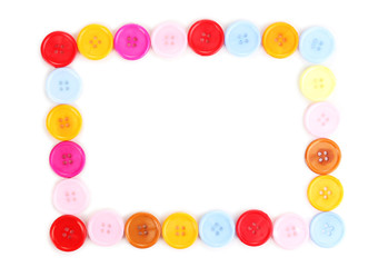 Colorful sewing buttons isolated on white