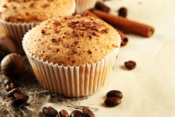 tasty muffin cakes with chocolate, spices and coffee seeds,