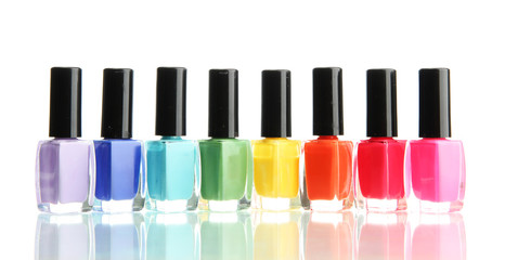 Group of bright nail polishes isolated on white