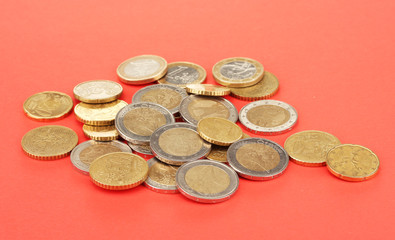 euro coins on color background