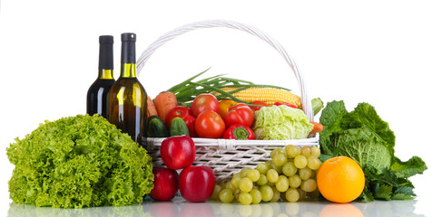 Composition with vegetables and fruits in wicker basket