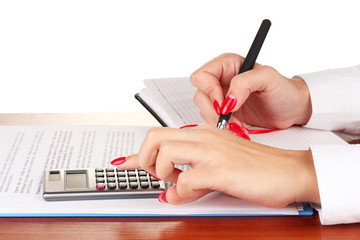 Business concept with pen and calculator