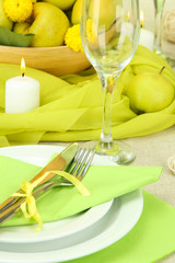 beautiful holiday table setting with apples, close up