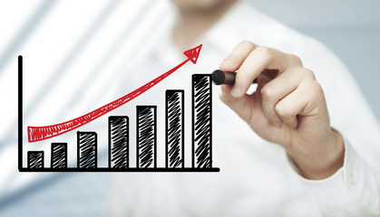 businessman drawing profit