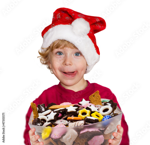 Kind mit Weihnachtsgebäck